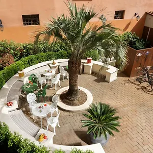 https://palm-suites.it-romehotels.com